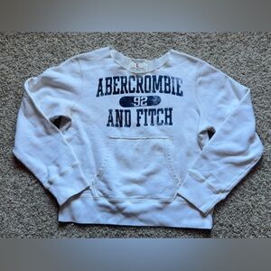 white Abercrombie & Fitch sweatshirt featuring a distressed graphic logo